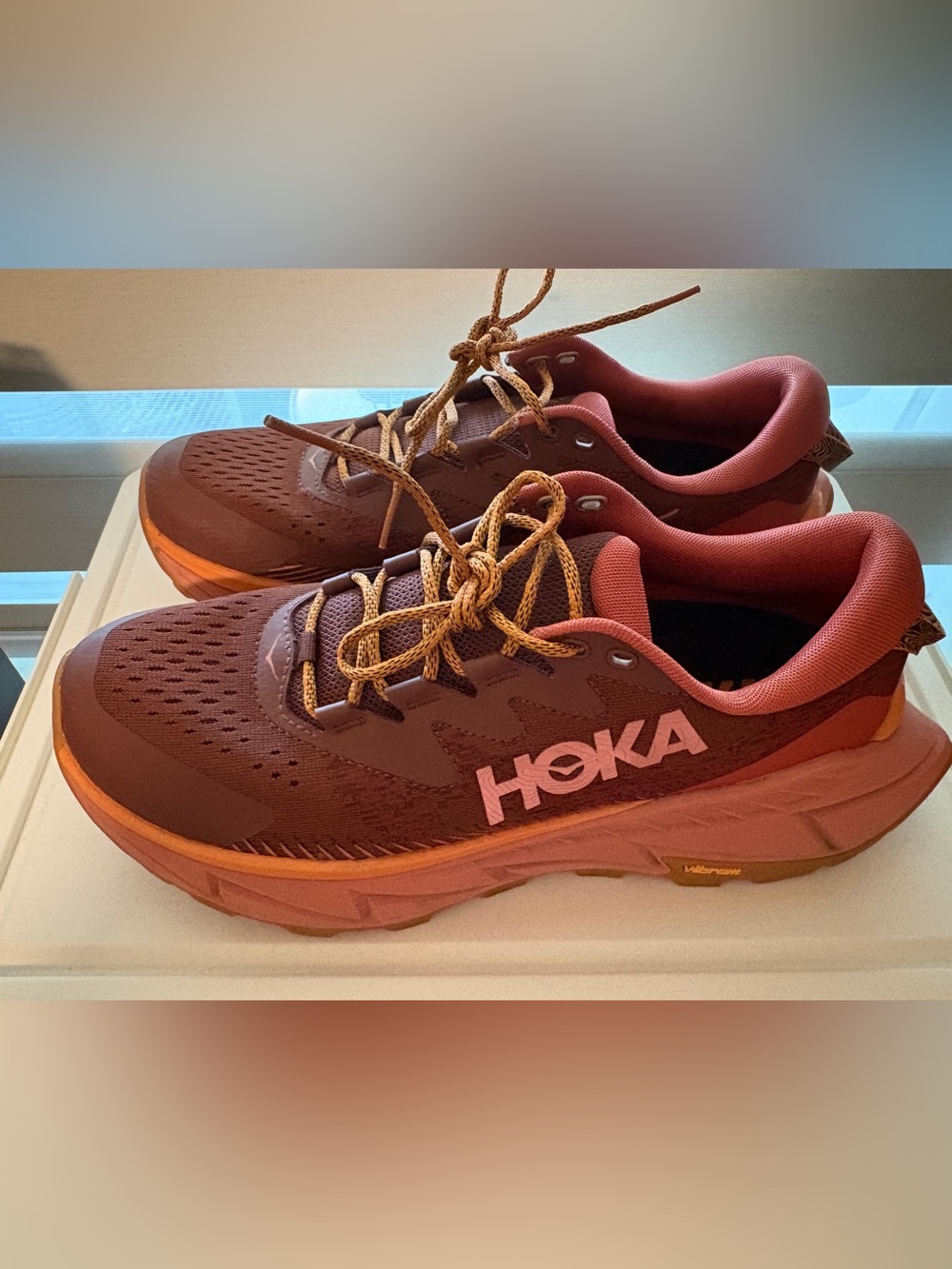 HOKA Women's Skyline-Float X in the "Spice / Hot Sauce" colorway